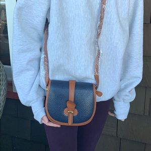 Dooney and Bourke NEW crossbody bag. Never used
